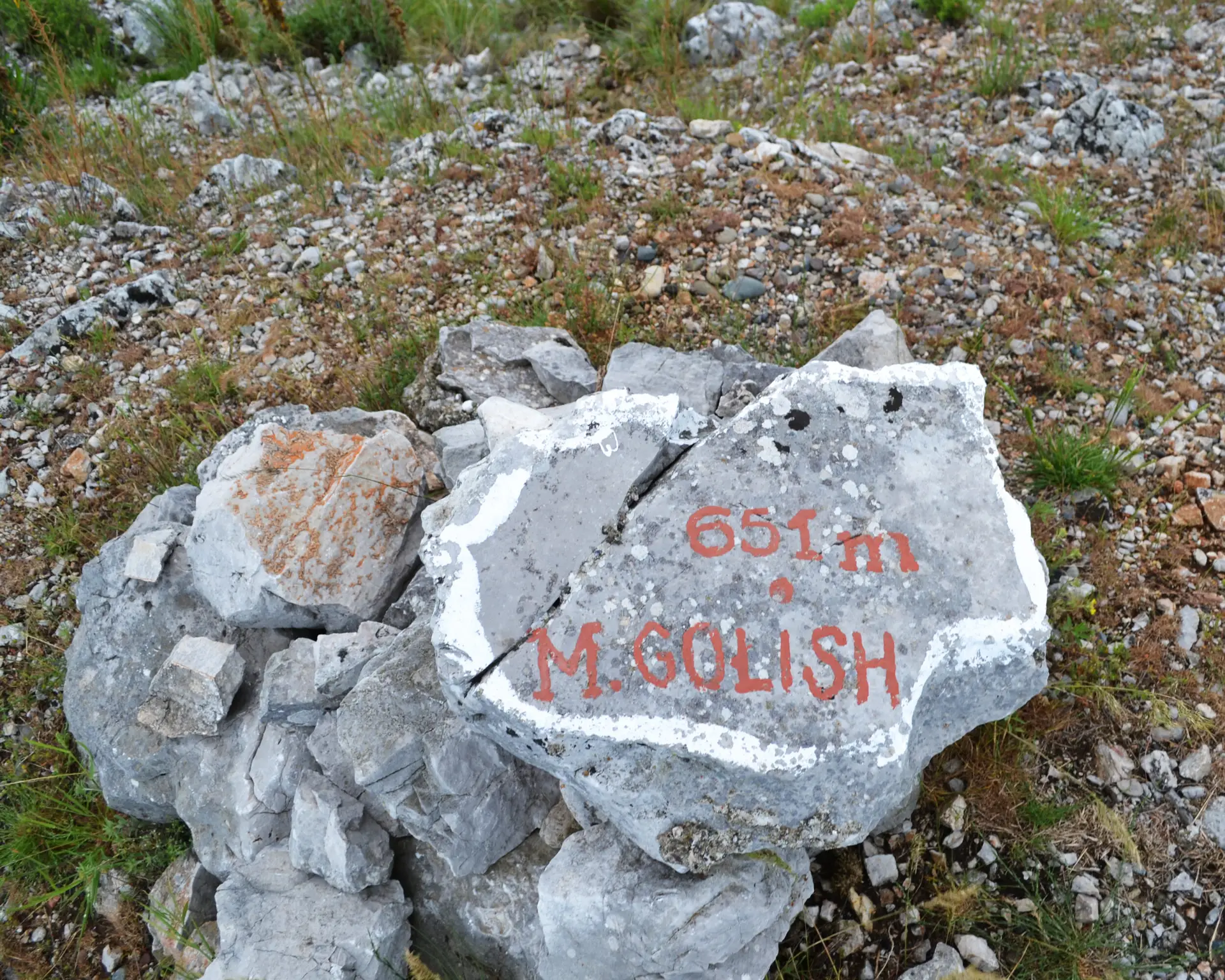 Marking stone at Golish Peak